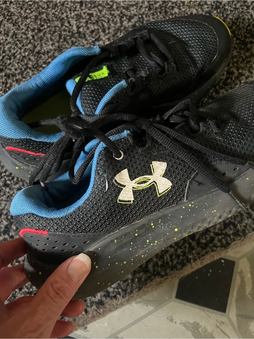Under Armour Kids Black Sneakers with Blue Lining and Neon Green Accents